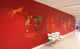 School Reception Wall Based on the History of Everything and the Future - designed by Toop Studio