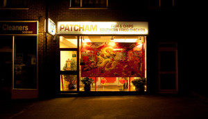 Fish and chips - painting installation by Shadric Toop - Chinese dragon in the window of patcham fish and chip shop
