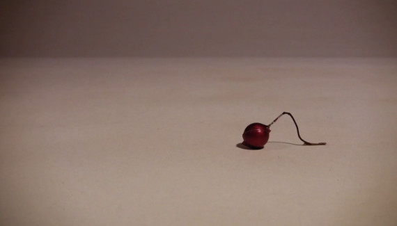 Small Christmas decoration crawling along - still from stop frame animation