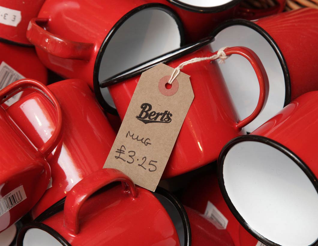 Berts swing tags on red tin cups - Toop Studio