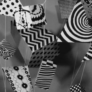 Patterns in Motion - Black and White patterned cuboids hanging in space - set for an ident video - Shadric Toop